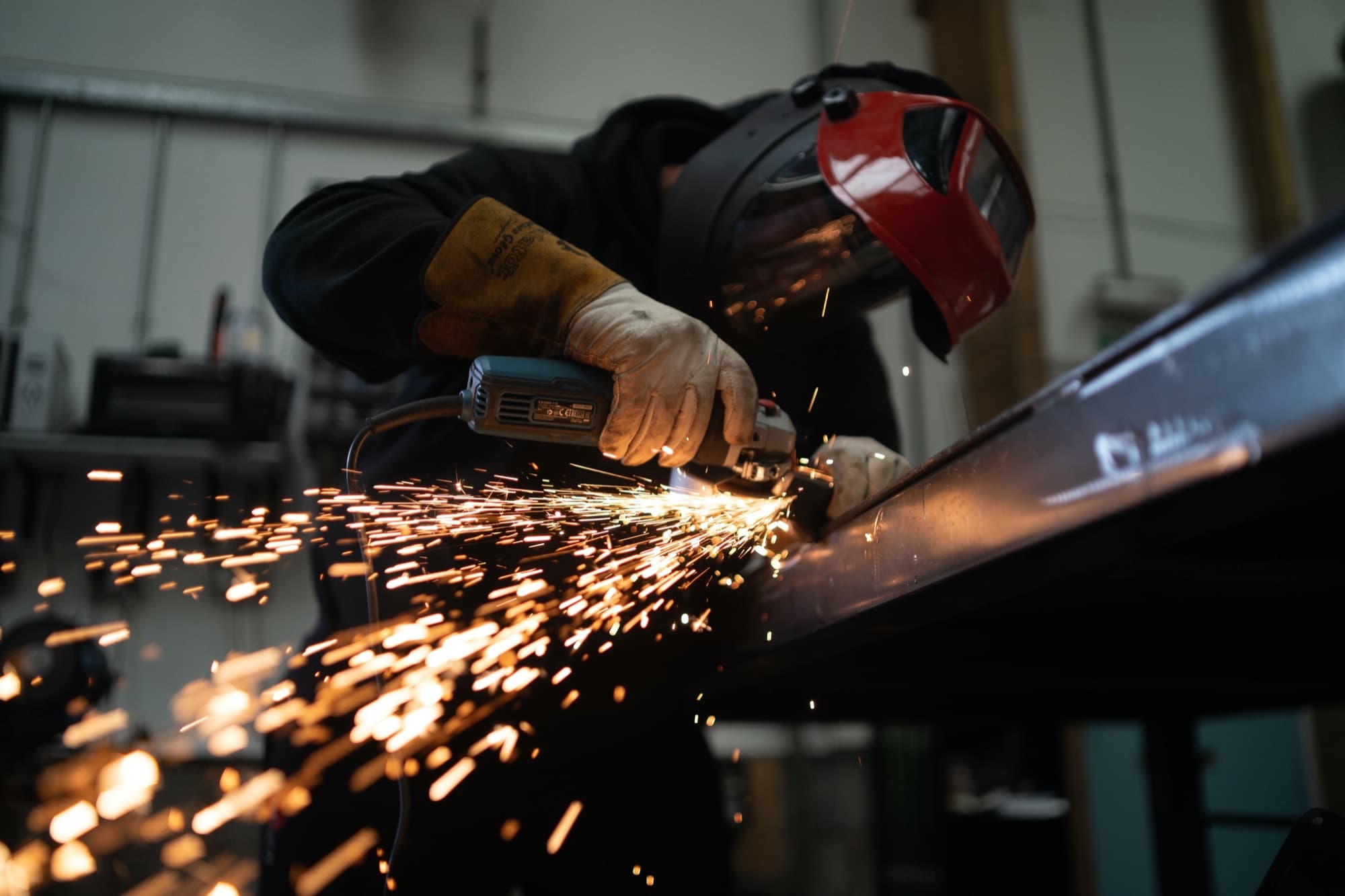 H&E in-house stone fabrication shop with bridge saw and polishing line